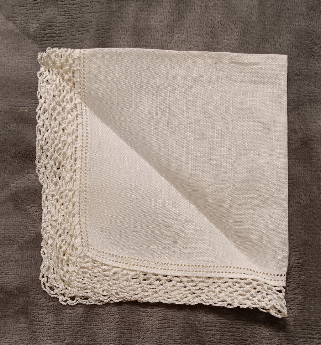 White handkerchief with white lace