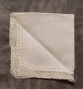 White handkerchief with white lace