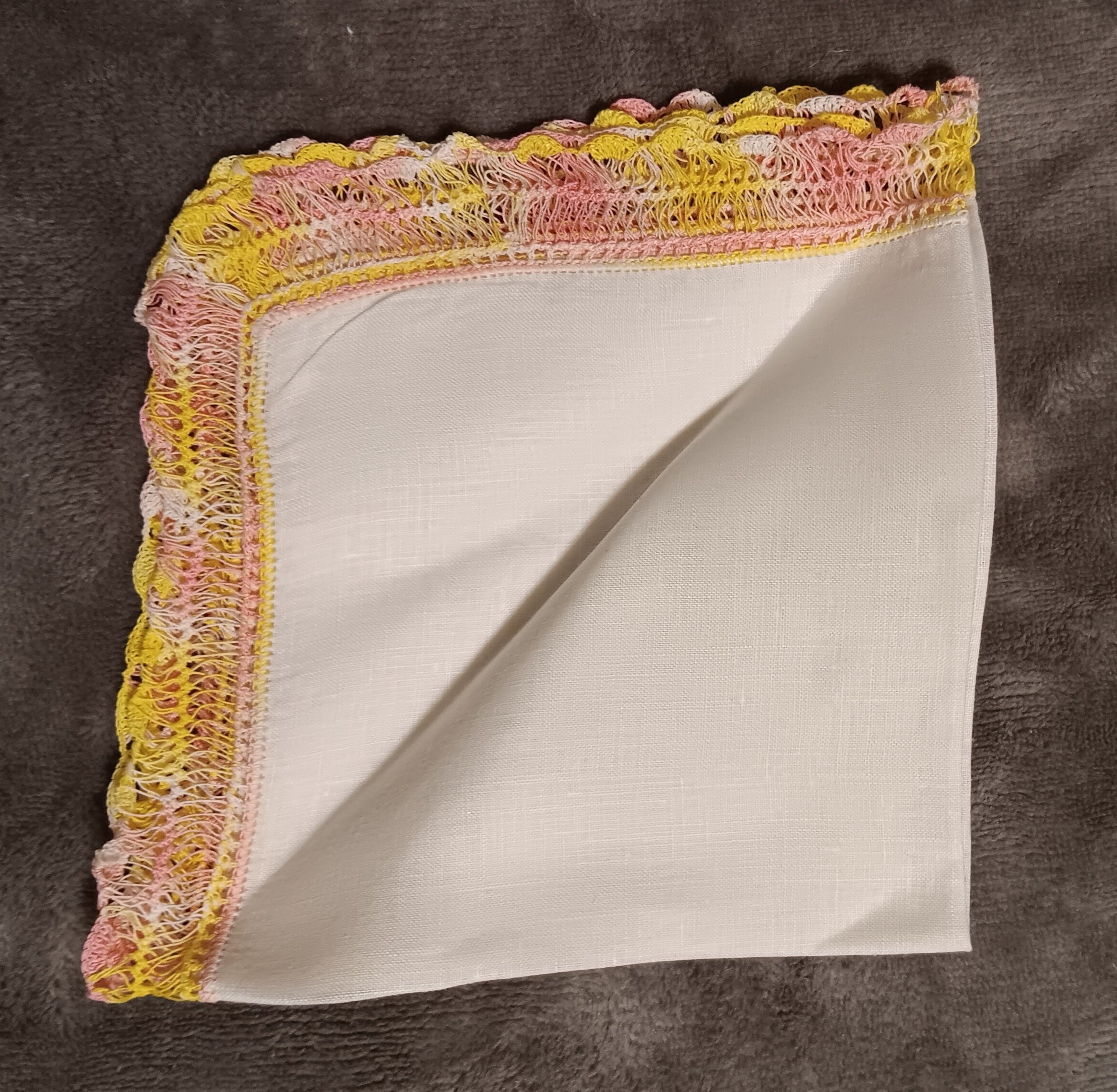 White handkerchief with pink and yellow lace