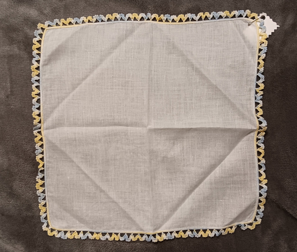 White handkerchief with blue and yellow lace