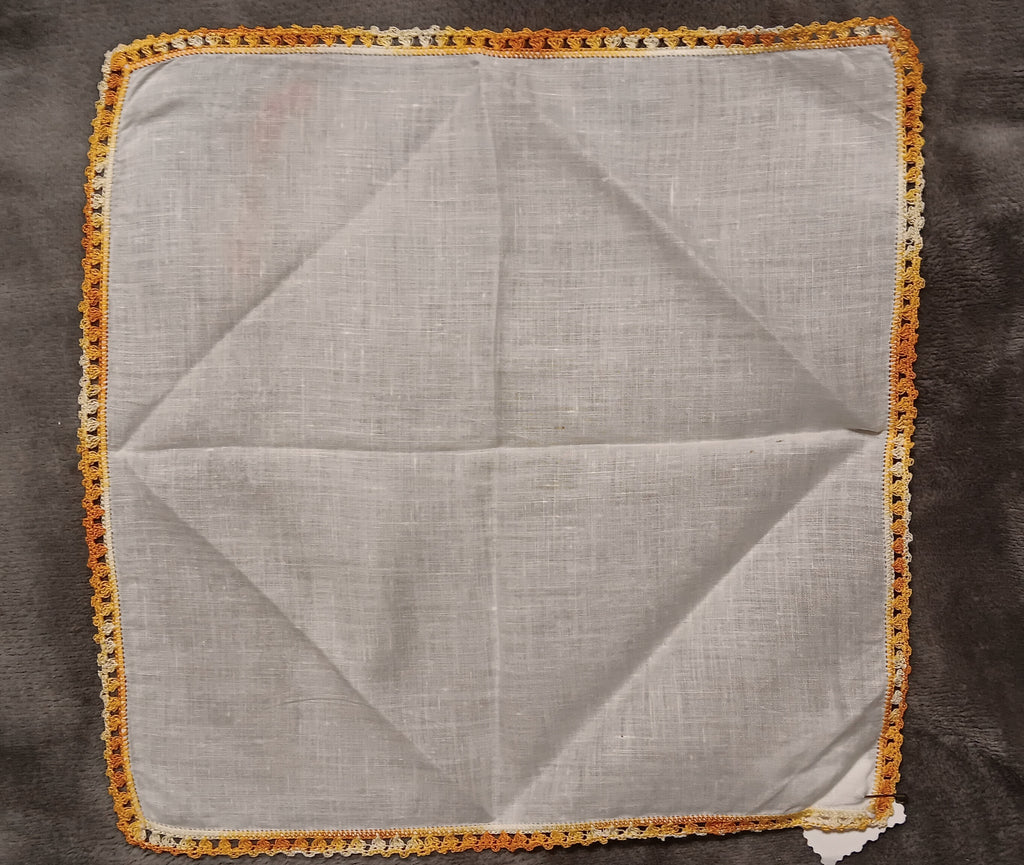 White handkerchief with orange lace